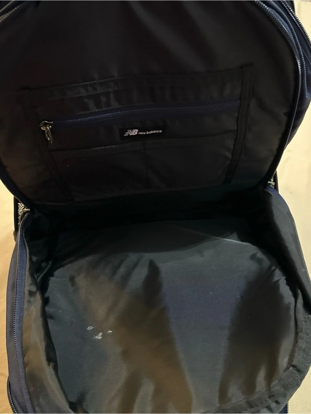 New Balance Buckle Flapbag Backpack Navy Blue Reflective Logo Laptop